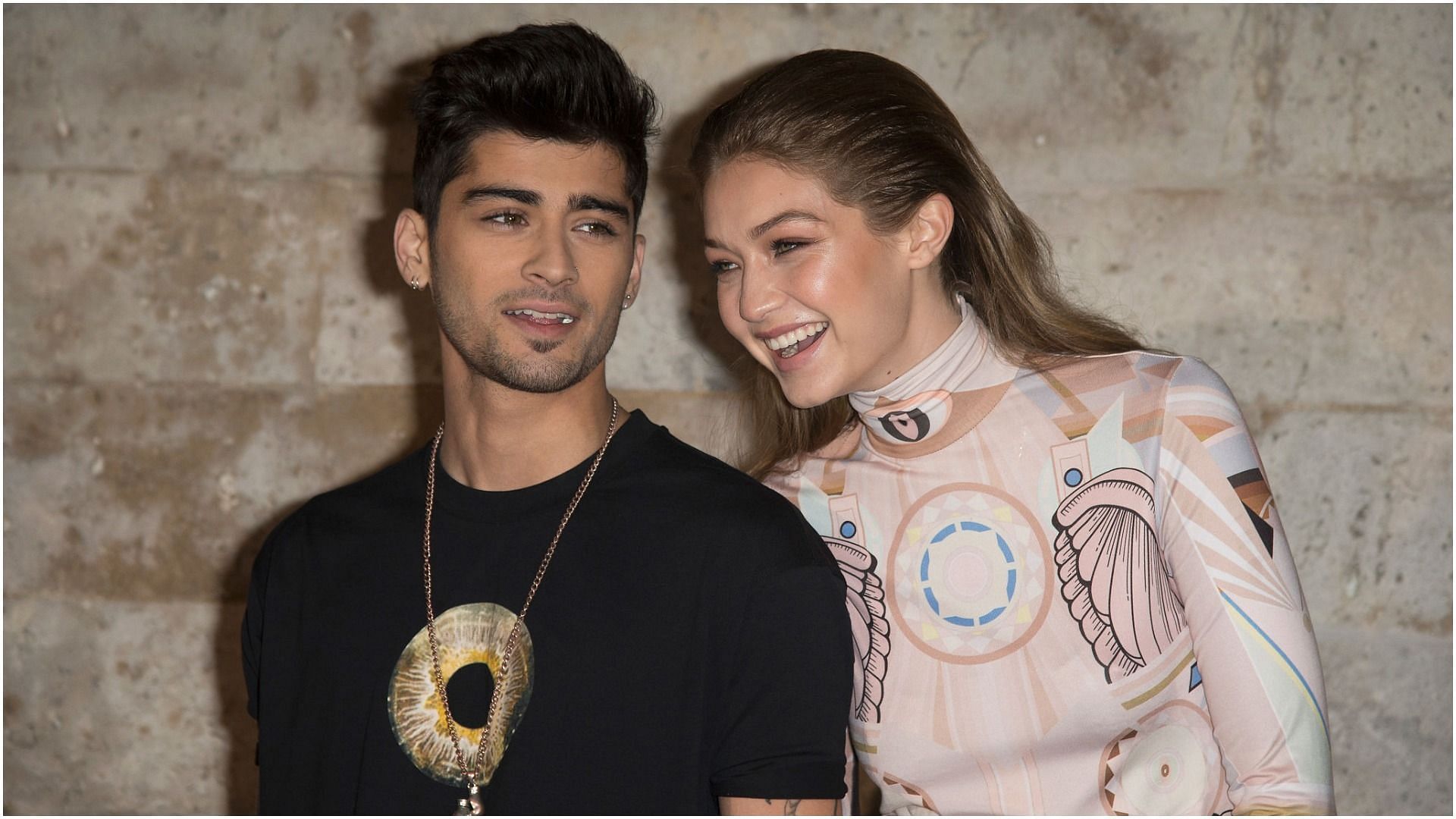 Zayn Malik and Gigi Hadid attend the Givenchy show as part of the Paris Fashion Week Womenswear Spring/Summer 2017 on October 2, 2016, in Paris, France (Image via Getty Images)
