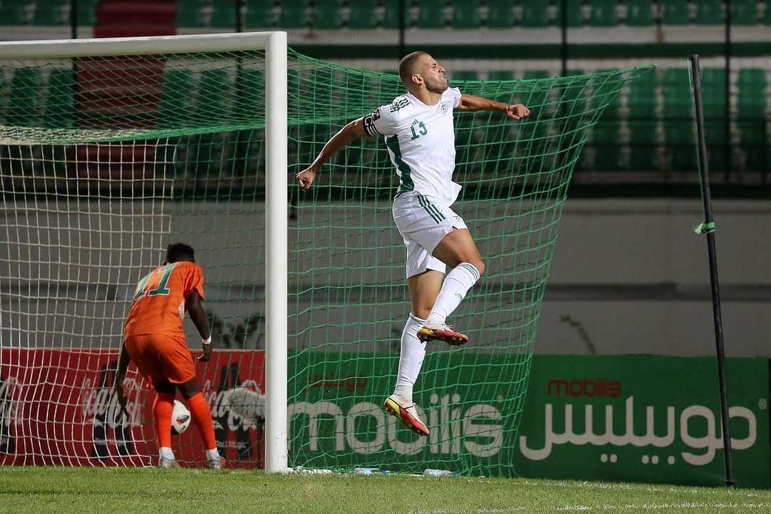 Islam Slimani celebrates after scoring for Algeria in the 2022 FIFA World Cup Qualifiers