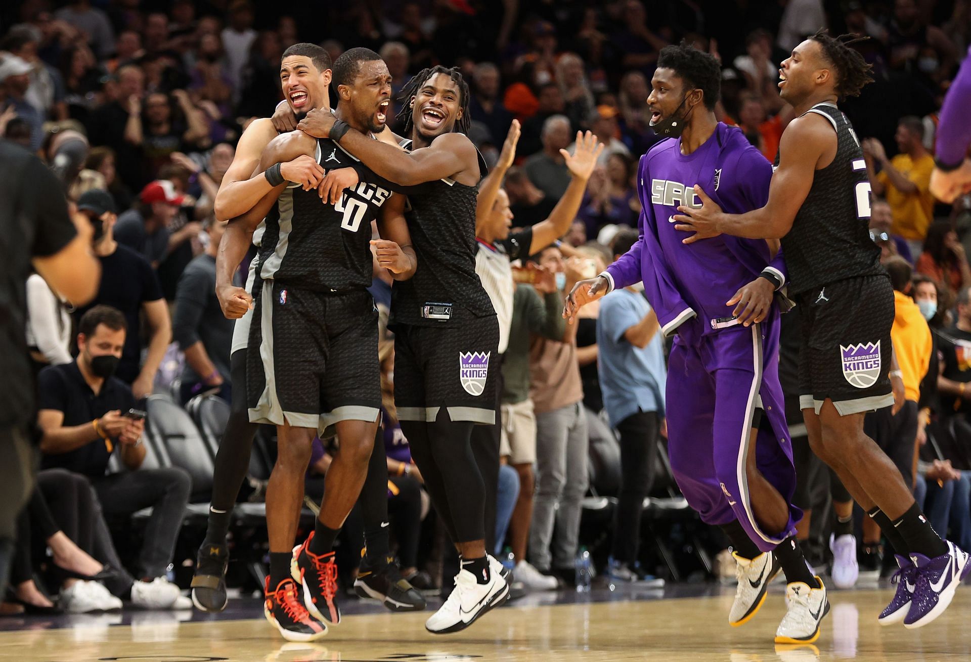 Sacramento Kings celebrate their win over the Phoenix Suns.