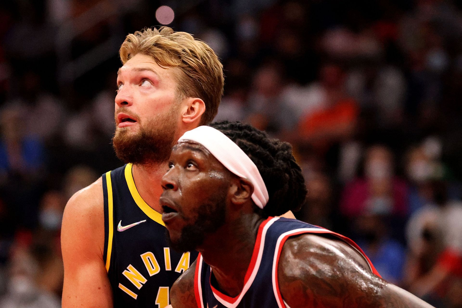 Domantas Sabonis of the Indiana Pacers and Montrezl Harrell of the Washington Wizards