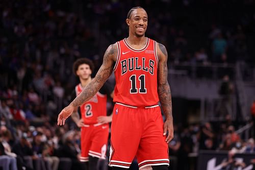 DeMar DeRozan #11 of the Chicago Bulls smiles in front of Lonzo Ball #2