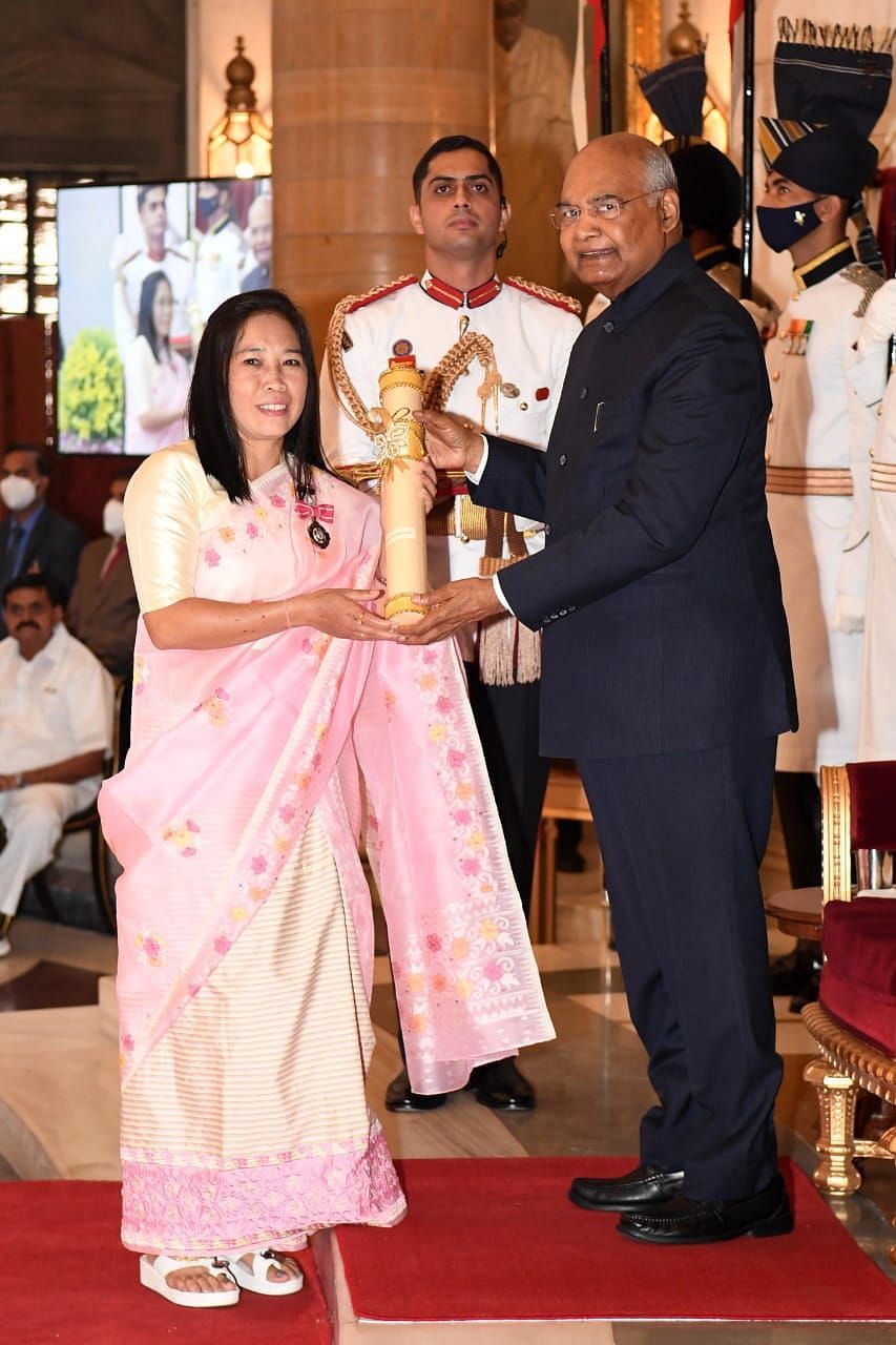 Former Indian player Oinam Bembem Devi receives the 2021 Padma Shri award.