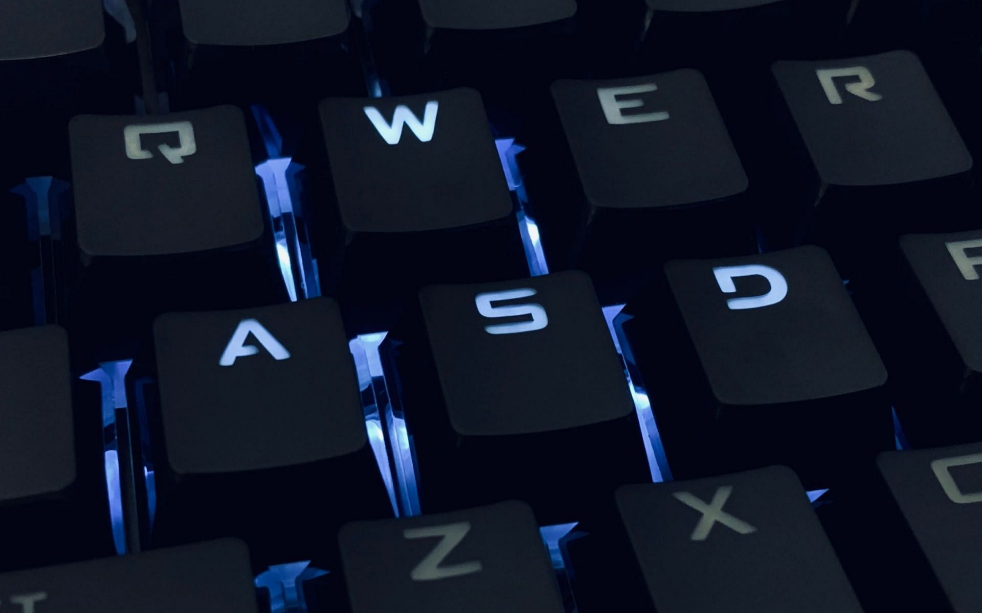 A keyboard with highlighted &#039;WASD&#039; buttons (Image via unsplash.com)