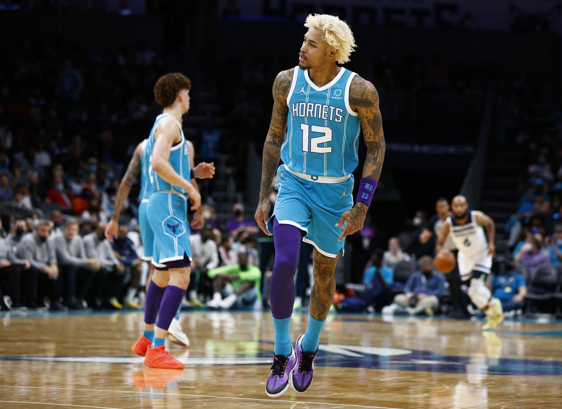 Kelly Oubre celebrates a play at the Minnesota Timberwolves v Charlotte Hornets game