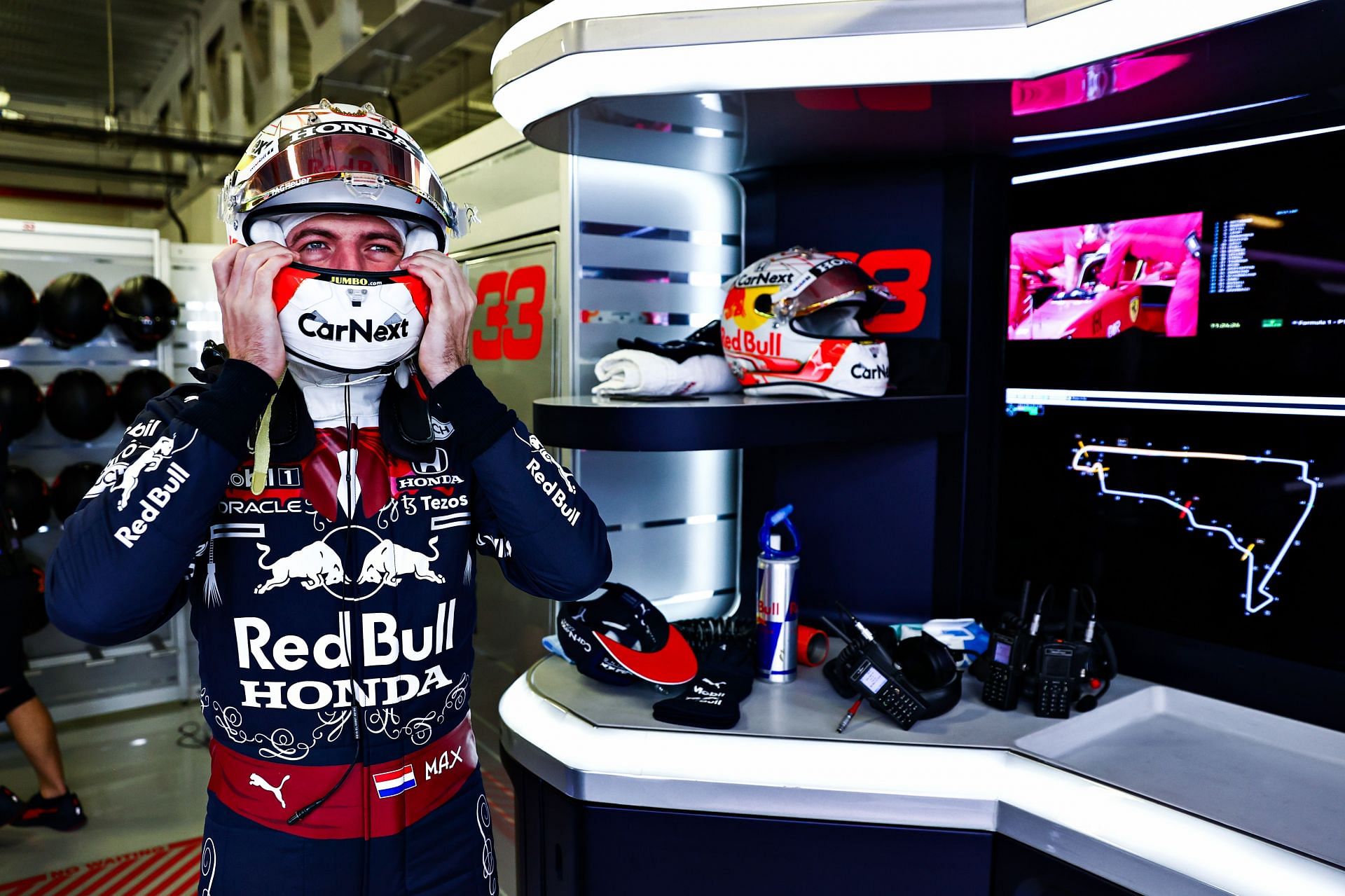 Max Verstappen prepares to drive in the garage during practice ahead of the 2021 Mexican GP. (Photo by Mark Thompson/Getty Images)