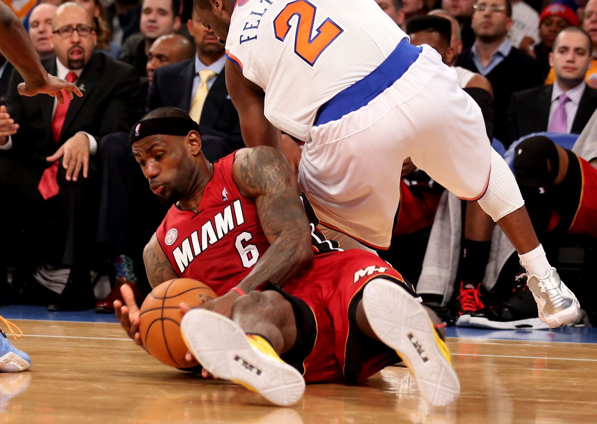 LeBron James dives for the loose ball against the New York Knicks.