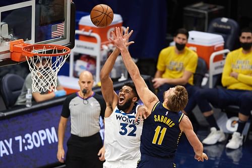 Karl-Anthony Towns of the Minnesota Timberwolves against Indiana Pacers' Domantas Sabonis