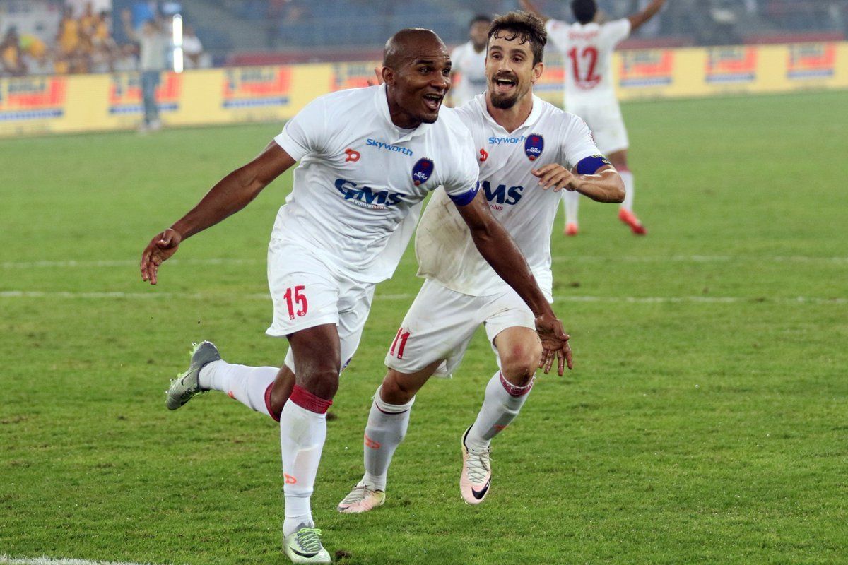 Florent Malouda (left) celebrates with Marcelinho (right) after scoring a goal. (Image Courtesy: Delhi Dynamos Twitter)