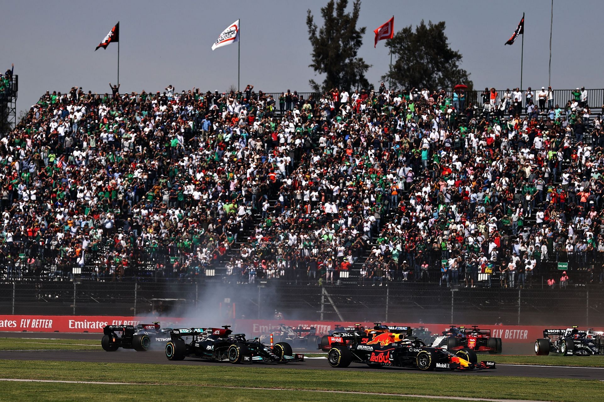 Max Verstappen leads Lewis Hamilton and the rest of the field at the start during the 2021 Mexican GP. (Photo by Lars Baron/Getty Images)