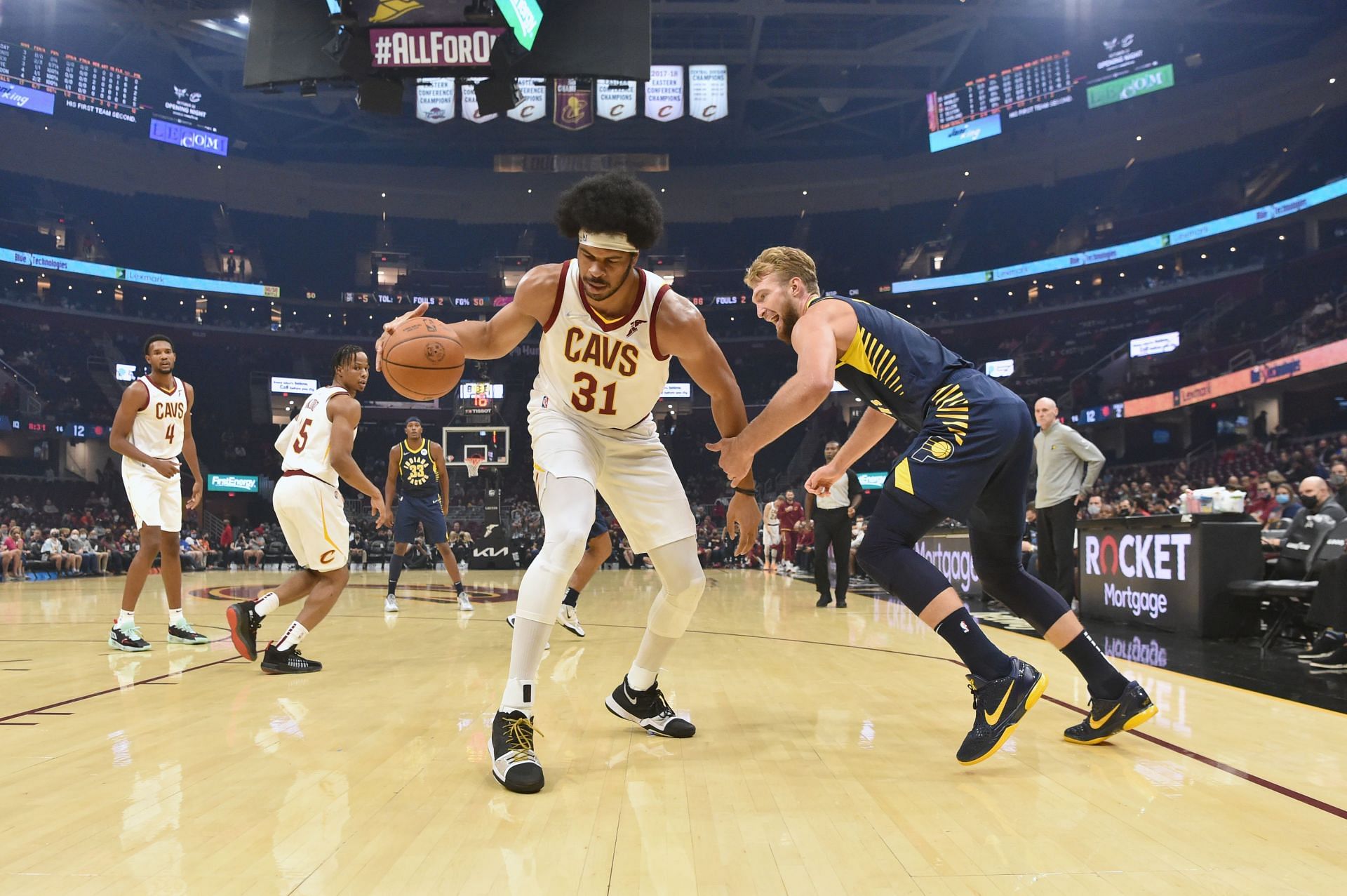 Jarrett Allen #31 of the Cleveland Cavaliers steals from Domantas Sabonis #11 of the Indiana Pacers during the second quarter at Rocket Mortgage Fieldhouse on October 08, 2021 in Cleveland, Ohio.