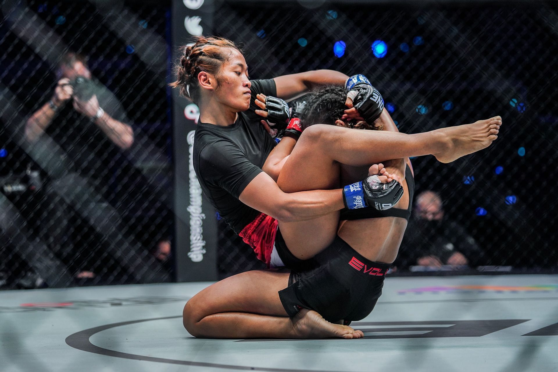 Team Lakay&#039;s Mark Sangiao points Jenelyn Olsim&#039;sout room for improvement after her fight against Ritu Phogat | Photo: ONE Championship