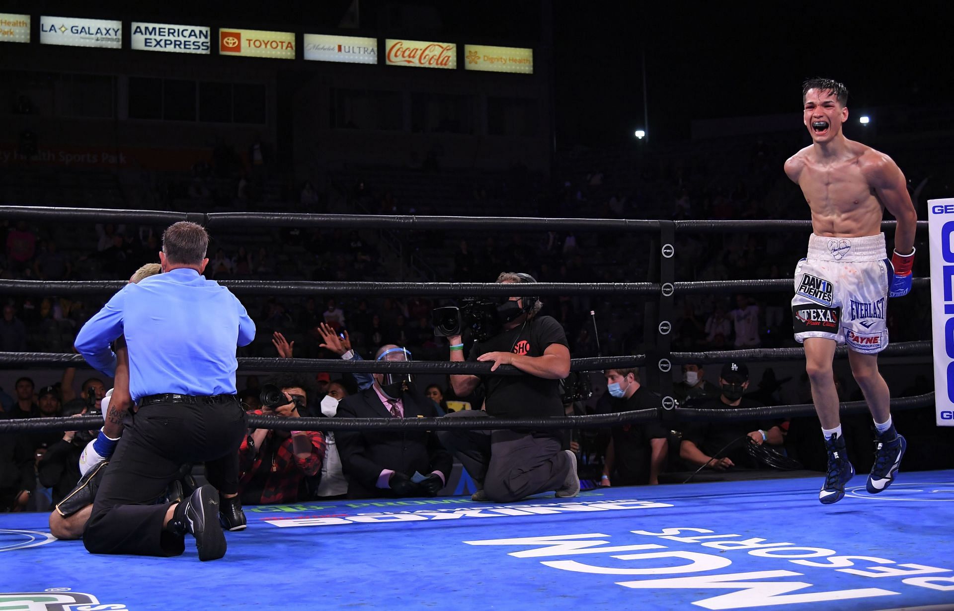 Brandon Figueroa celebrating following his win over Luis Nery