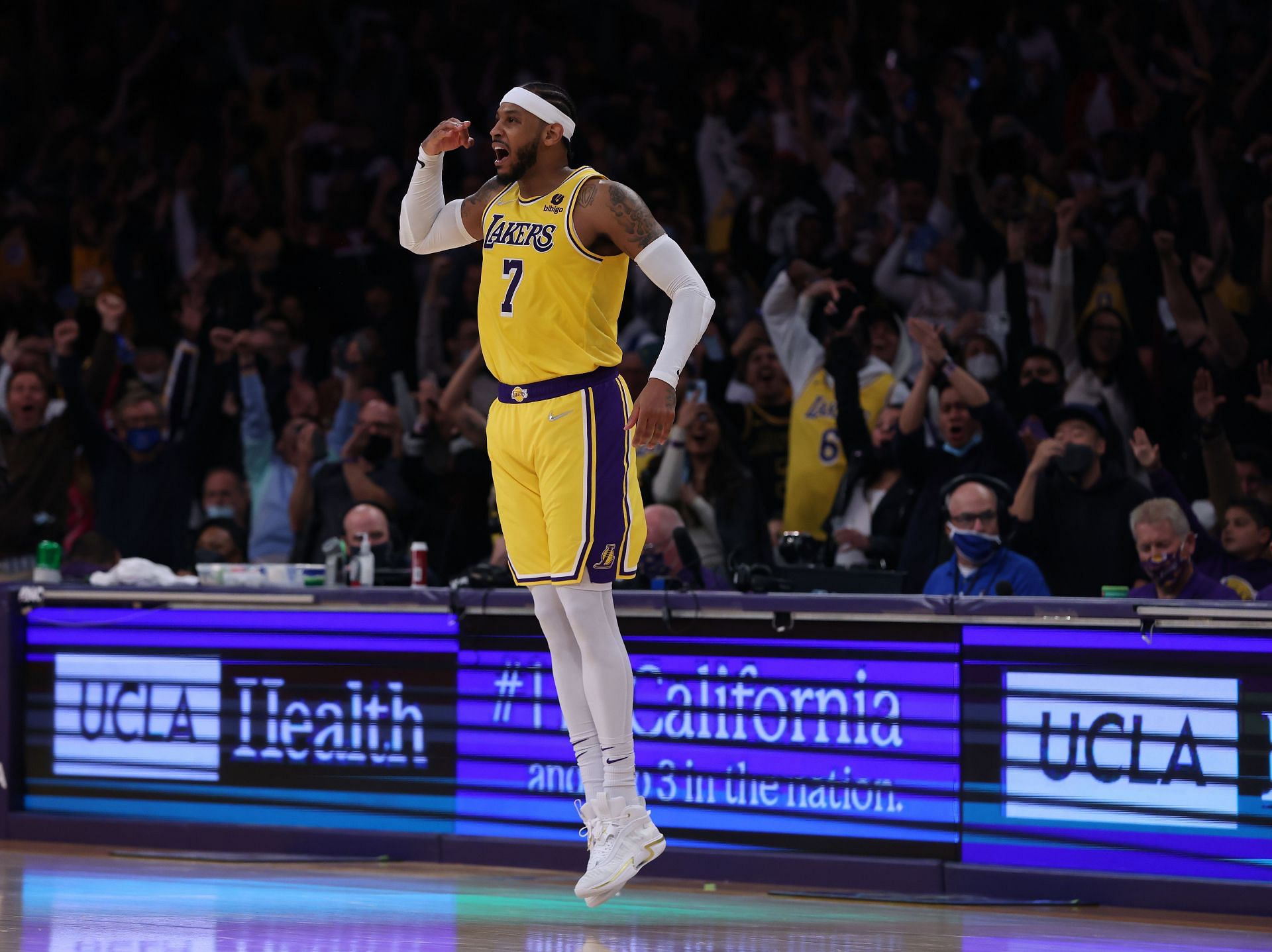 LA Lakers&#039; Carmelo Anthony reacts after making a three-point field goal.