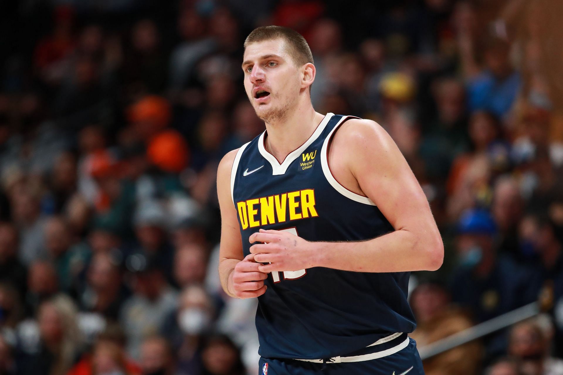 Nikola Jokic #15 of the Denver Nuggets runs down the court during the game against the Portland Trail Blazers at Ball Arena on November 14, 2021 in Denver, Colorado.