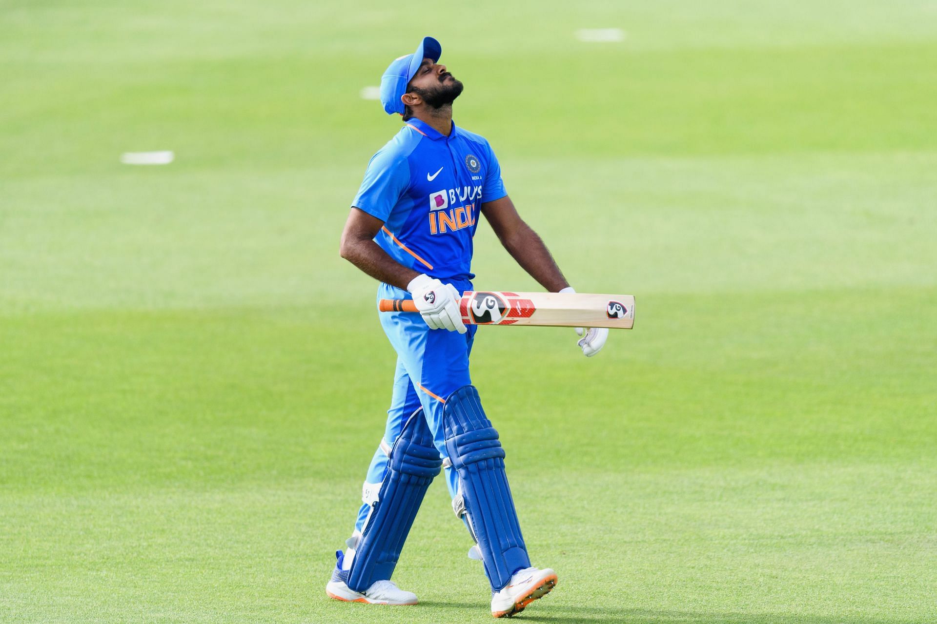 Vijay Shankar walks back to the pavilion during a game for India A.