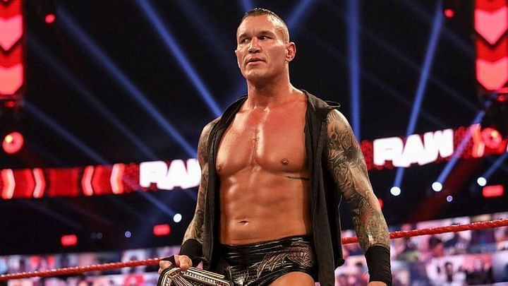 What does Randy Orton have tattooed on his ribs?