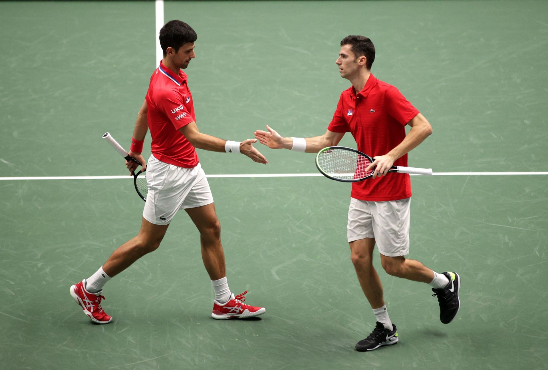 Novak Djokovic and Nikola Cacic at the 2021 Davis Cup.