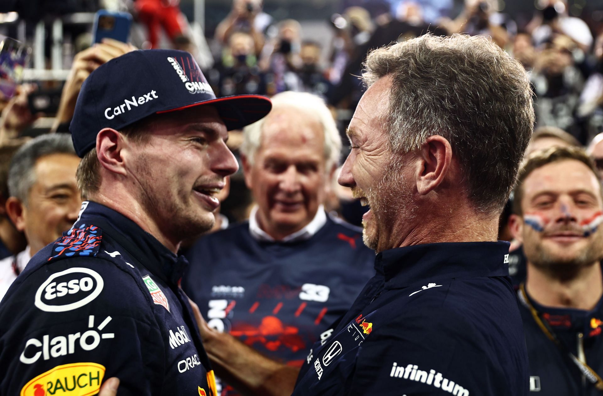 F1 Grand Prix of Abu Dhabi - Max Verstappen celebrates with team principal Christian Horner.