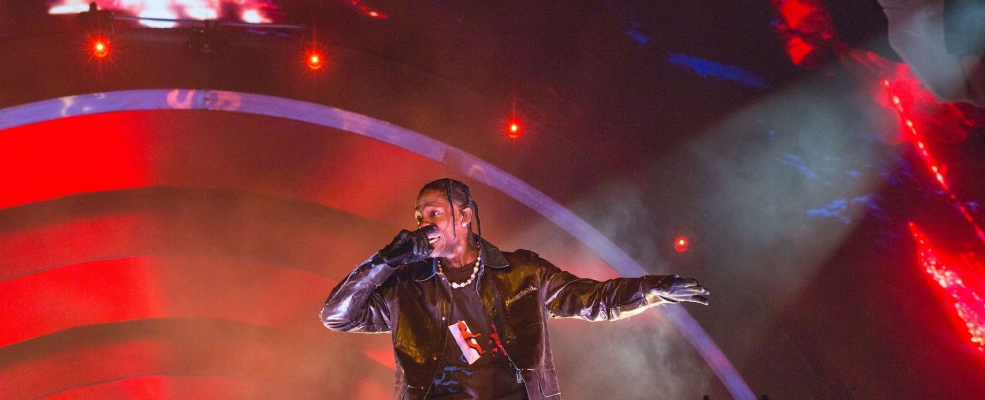Travis Scott previously said he was &quot;devastated&quot; over the Astroworld tragedy (Image via Rick Kern/Getty Images)