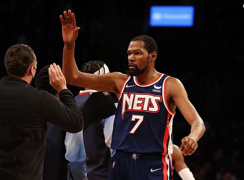 Kevin Durant #7 of the Brooklyn Nets celebrates a 114-105 win against the Philadelphia 76ers during their game at Barclays Center on December 16, 2021 in New York City.