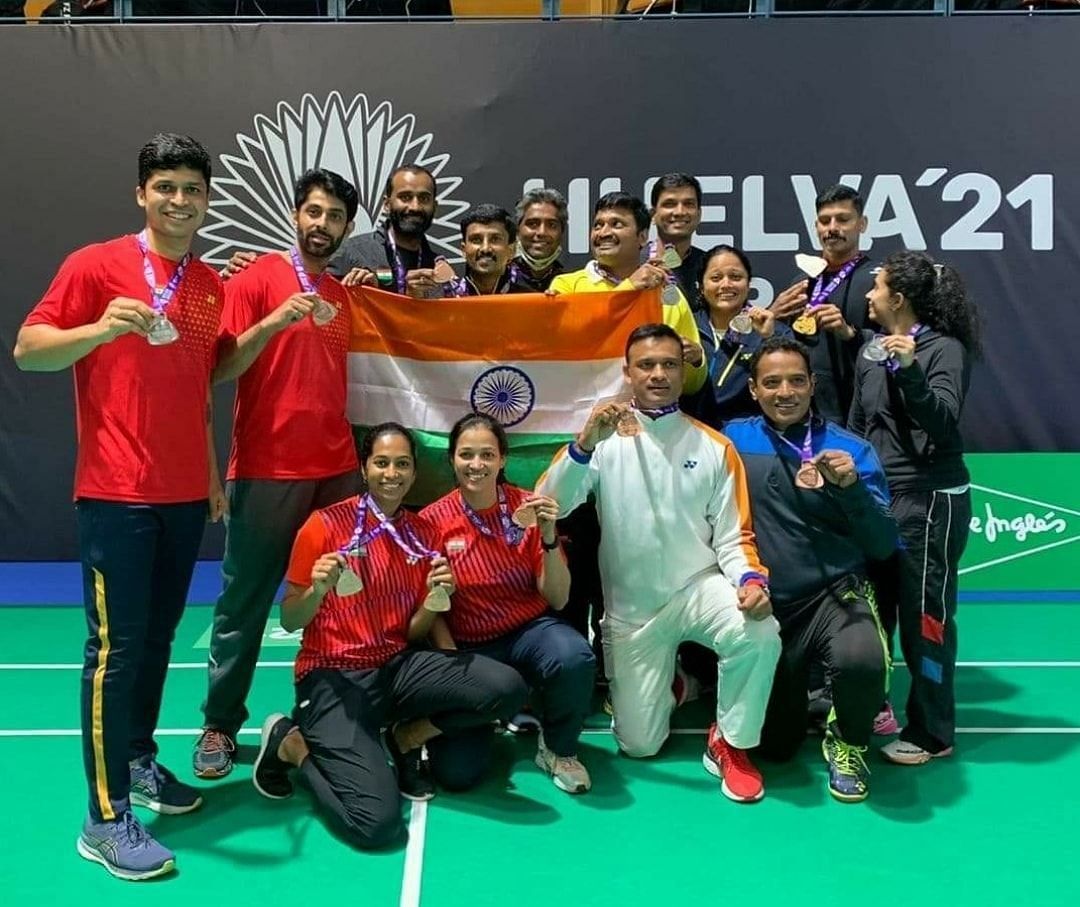 All the medal winners from India pose with the national flag in Huelva, Spain