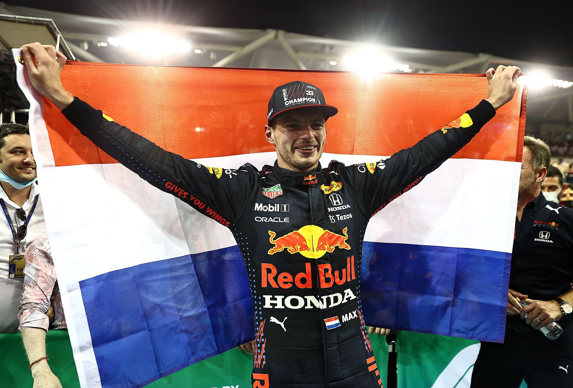 Race winner and 2021 F1 champion Max Verstappen celebrates in Parc Ferme during the F1 Grand Prix of Abu Dhabi at Yas Marina Circuit. (Photo by Mark Thompson/Getty Images)