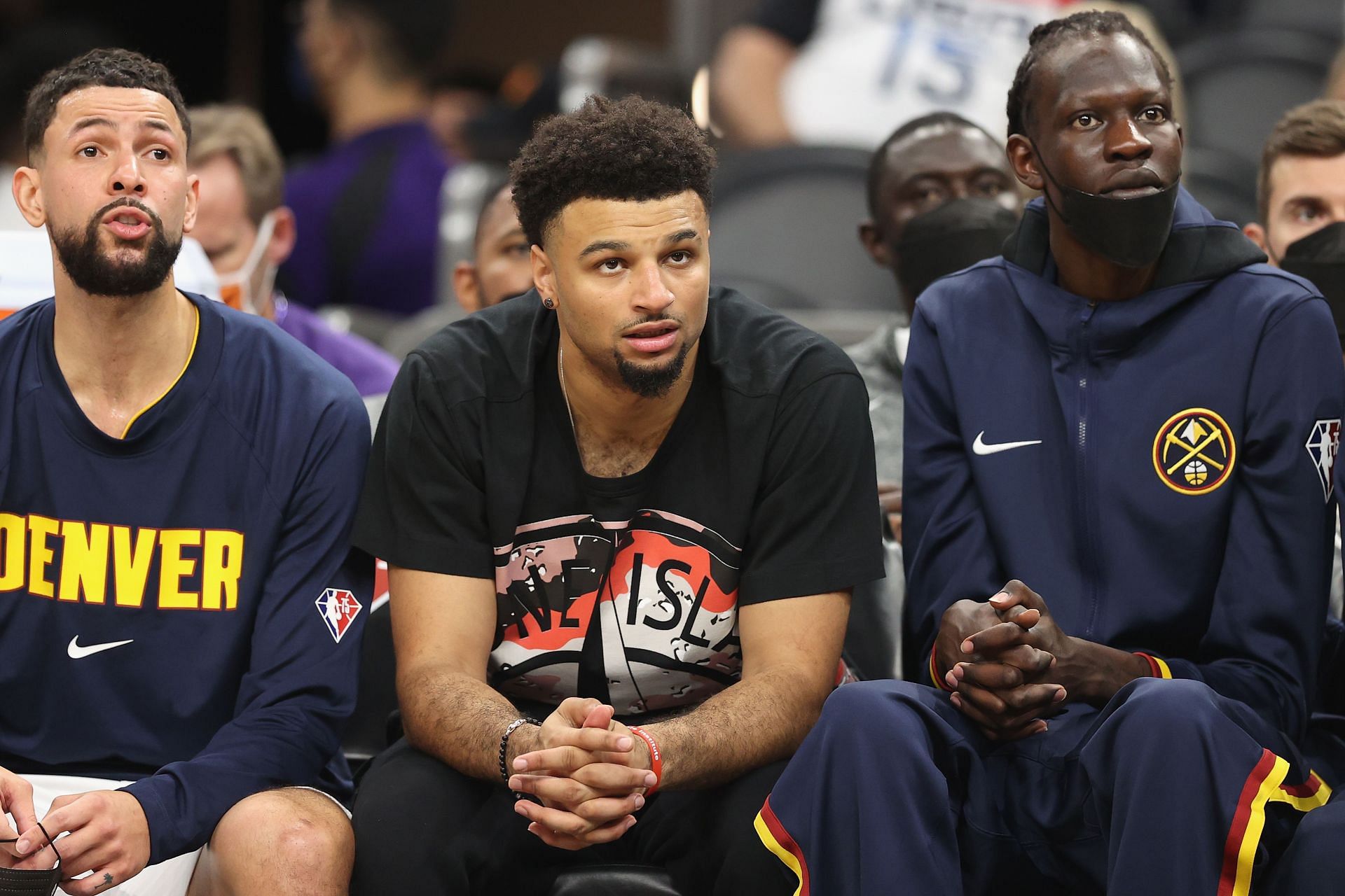 Jamal Murray of the Denver Nuggets on the bench with Bol Bol and Austin Rivers