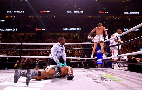 Jake Paul celebrates after knocking out Tyron Woodley