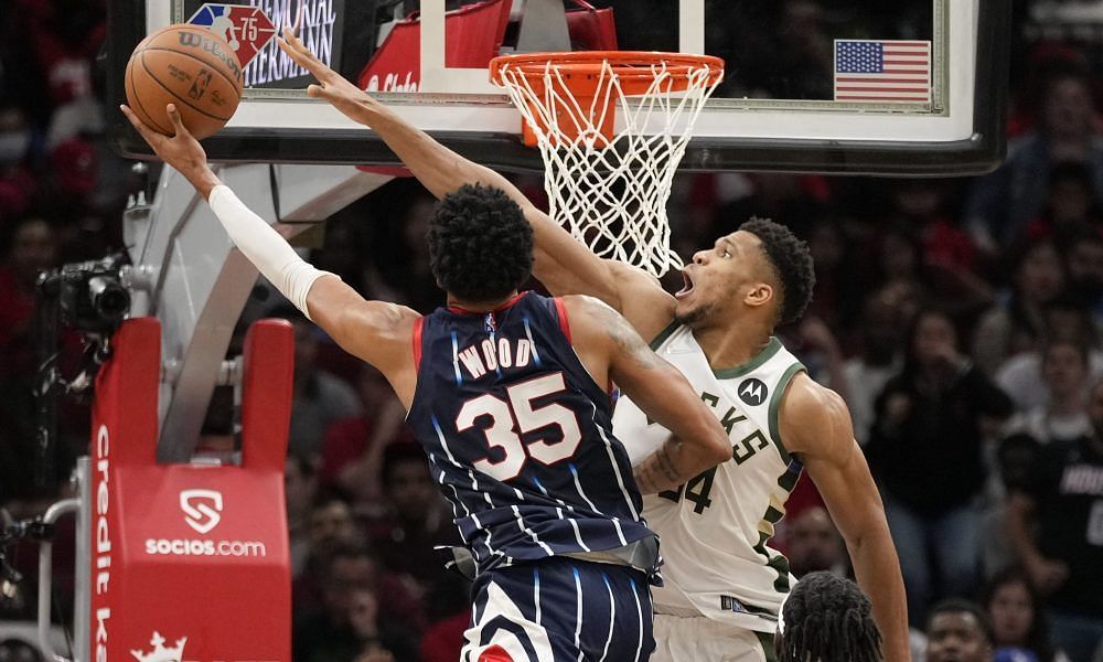 Giannis Antetokounmpo of the Milwaukee Bucks meets Houston Rockets&#039; Christian Wood at the rim