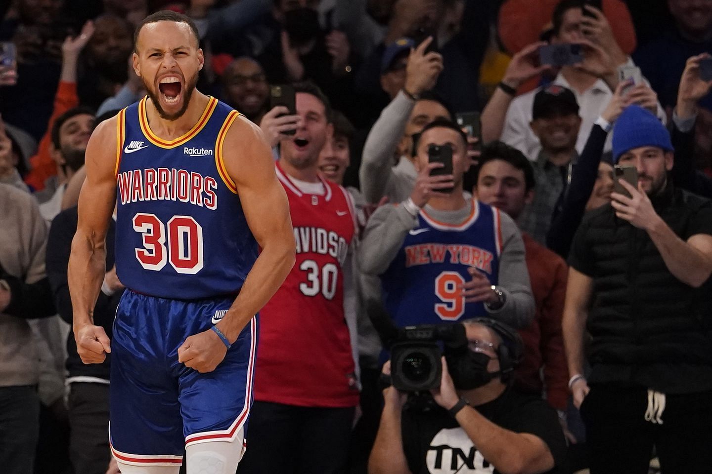 Steph Curry just set the NBA 3-pointer record in front of a raucous Madison Square Garden crowd. [Photo: The Boston Globe]