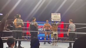 Video: Roman Reigns responds to fan sign mocking him at WWE Live Event