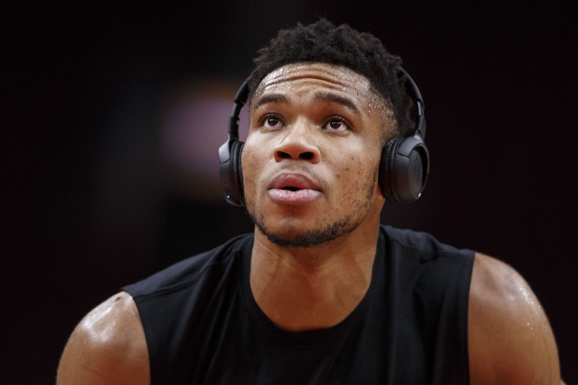 Giannis Antetokounmpo warms up ahead of a game