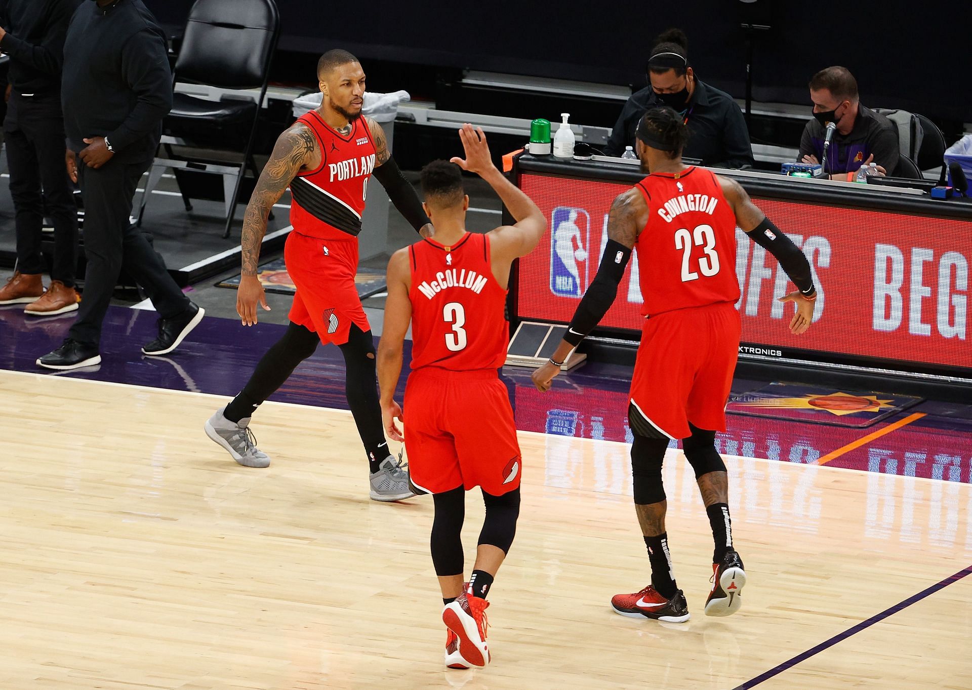 Damian Lillard, CJ McCollum and Robert Covington of the Portland Trail Blazers