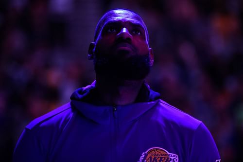 LA Lakers' LeBron James looks on as the national anthem plays before a game