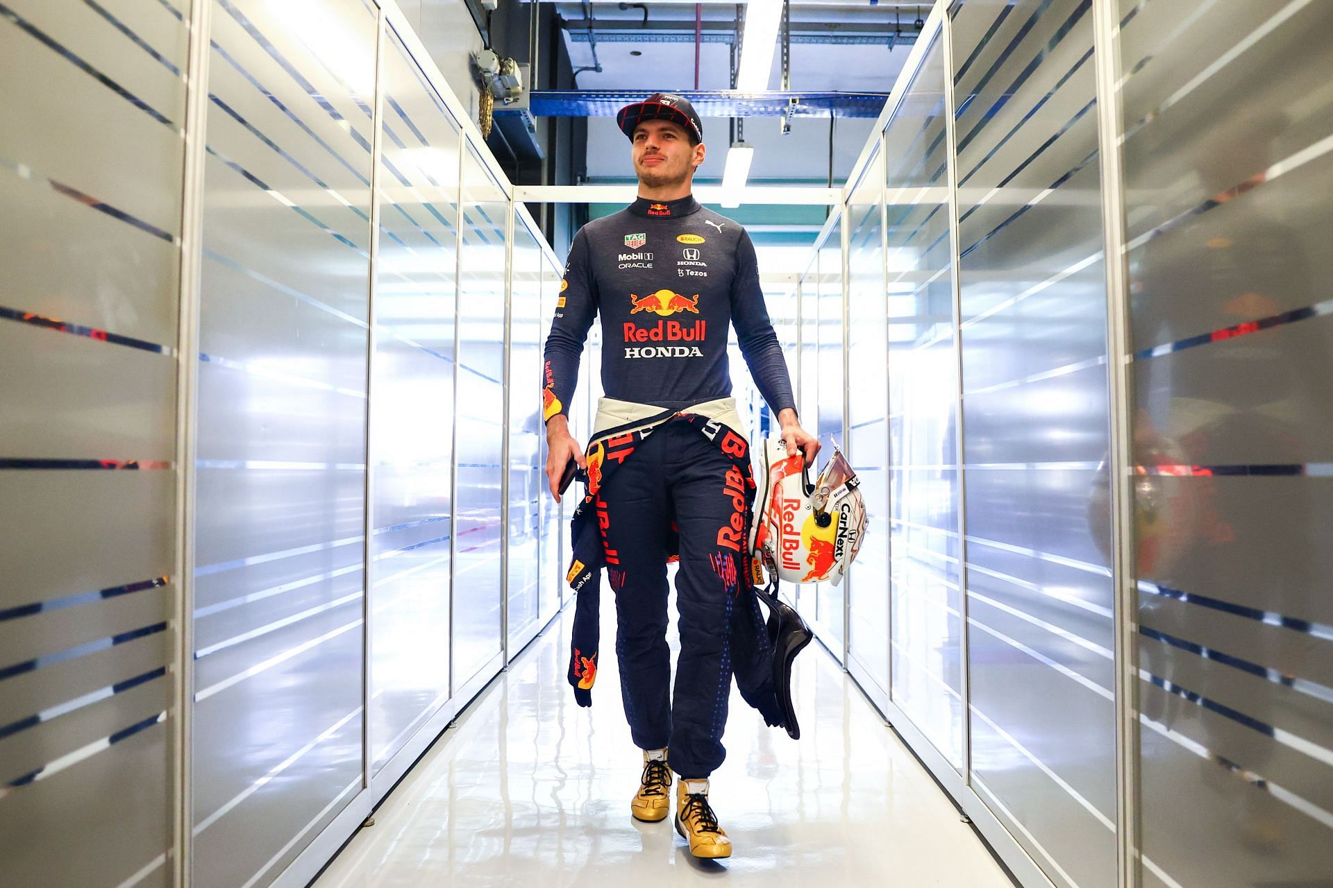 Max Verstappen walks into the garage during Formula 1 testing at Yas Marina Circuit. (Photo by Clive Rose/Getty Images)