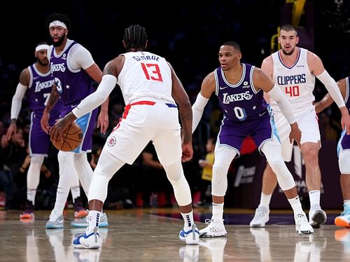 Russell Westbrook guarding Paul George