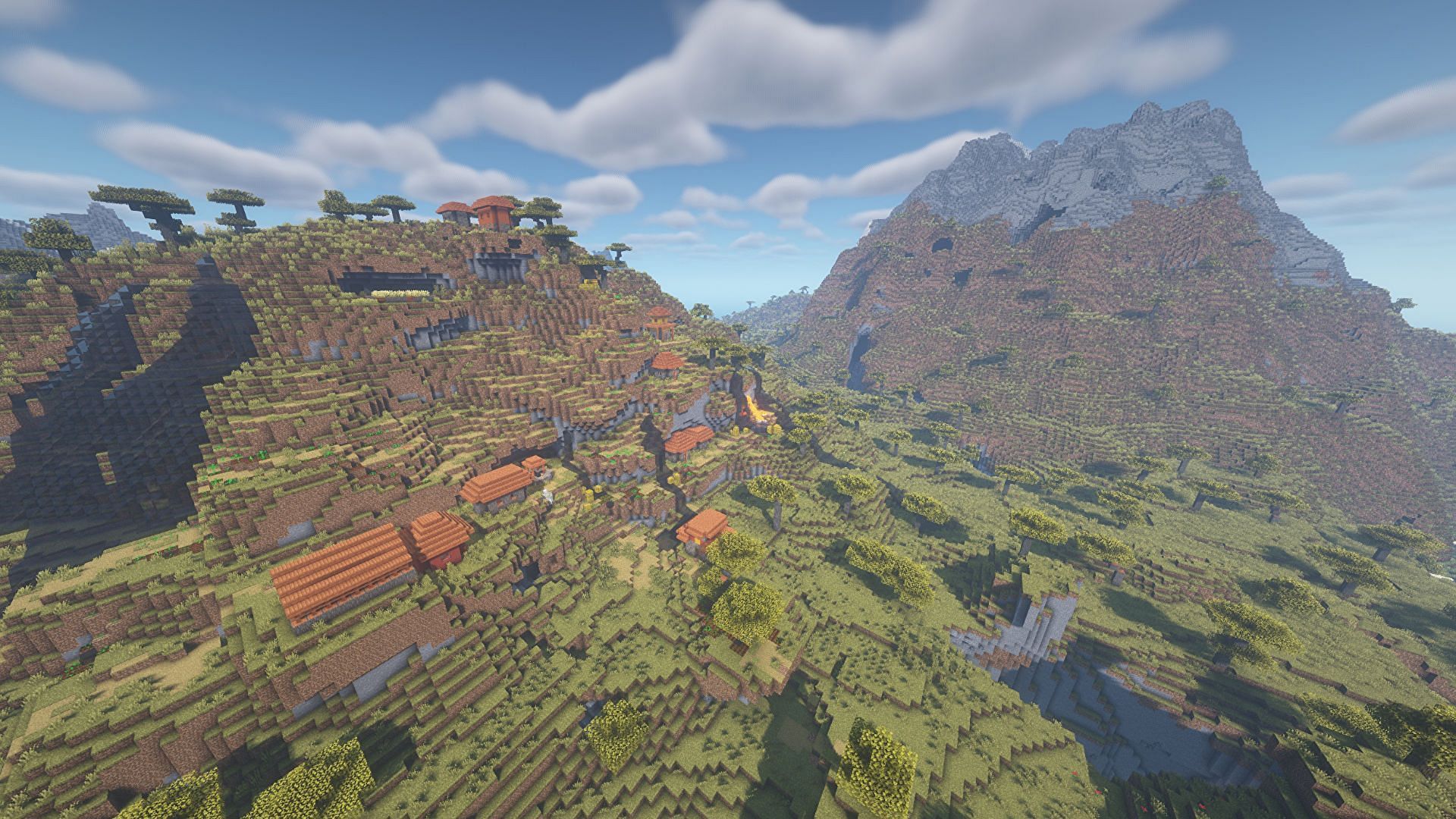 A hillside savanna village (Image via Minecraft)
