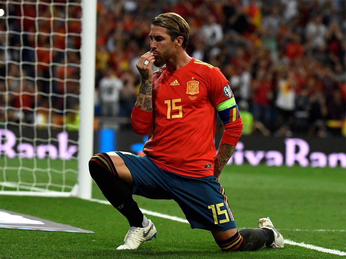 Sergio Ramos blowing a kiss to the fans after scoring a goal.