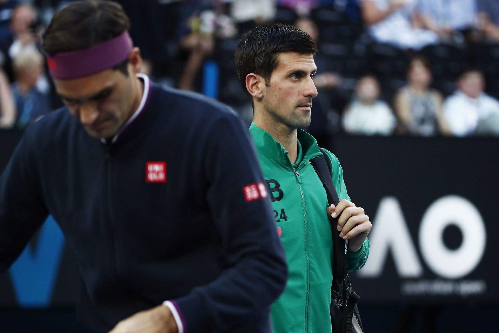 Roger Federer (L) and Novak Djokovic at the Australian Open 2020
