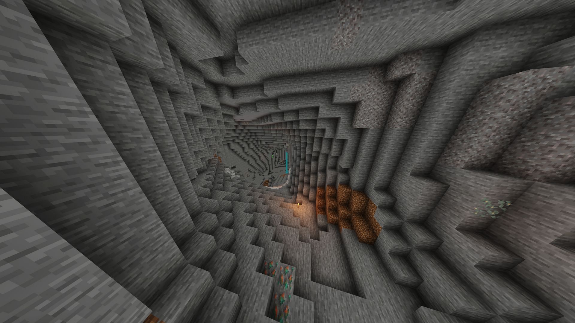 This seed spawns the player near a huge cavern (Image via Minecraft)