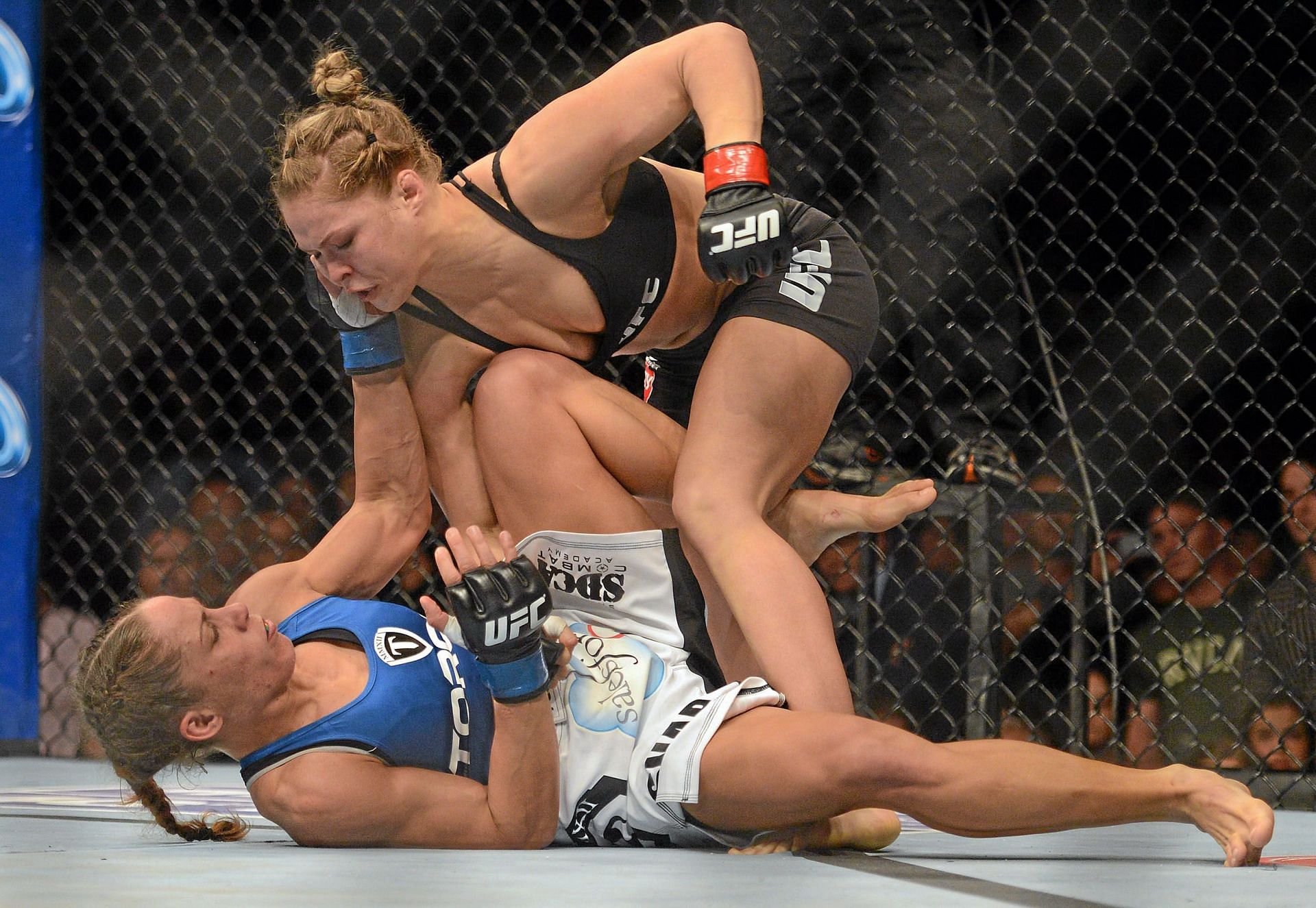 Ronda Rousey had to fight out of some bad positions to take out Liz Carmouche in a stone cold classic at UFC 157