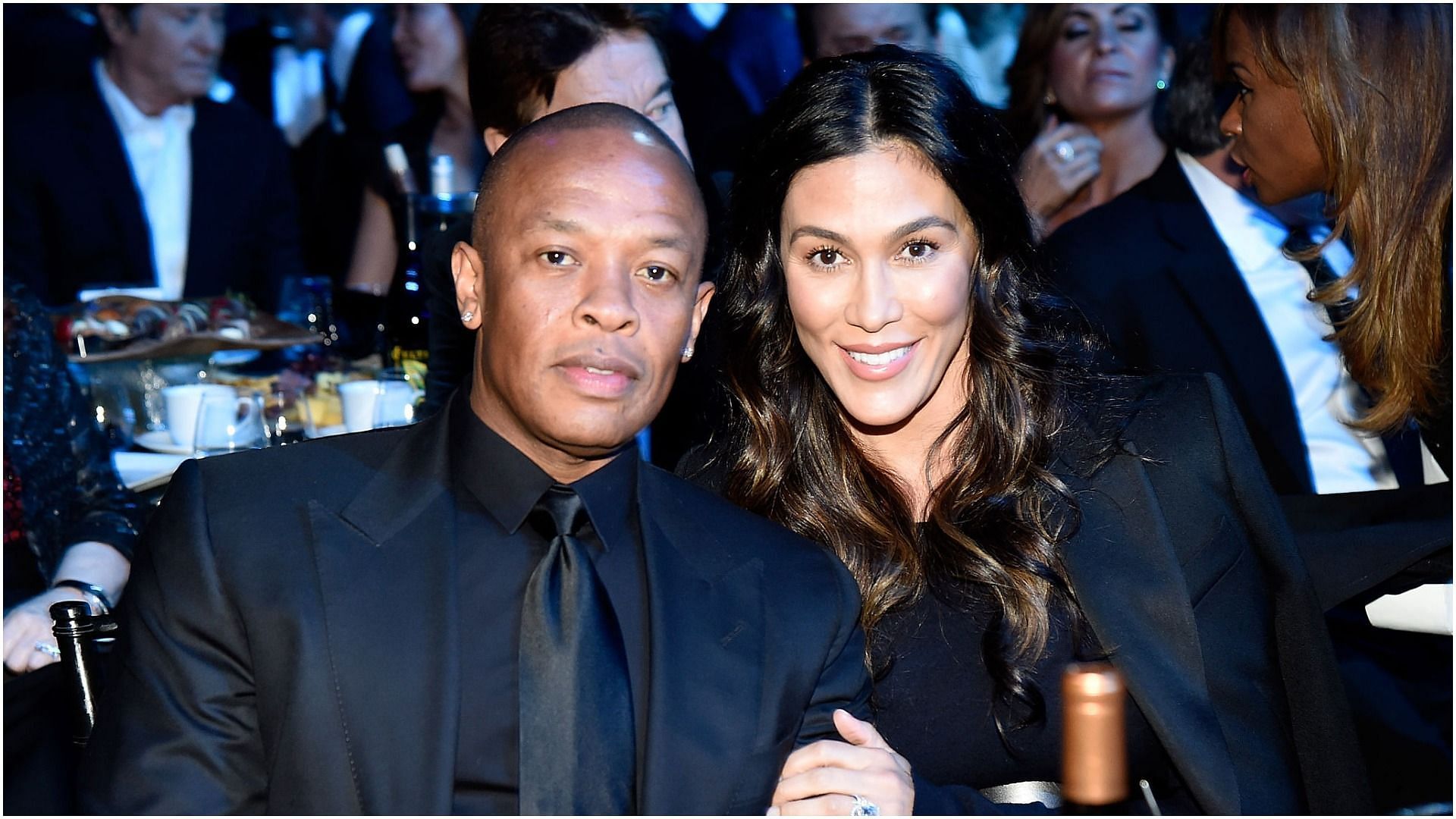 Dr. Dre and Nicole Young attend the 31st Annual Rock And Roll Hall Of Fame Induction Ceremony (Image via Getty Images/Kevin Mazur)