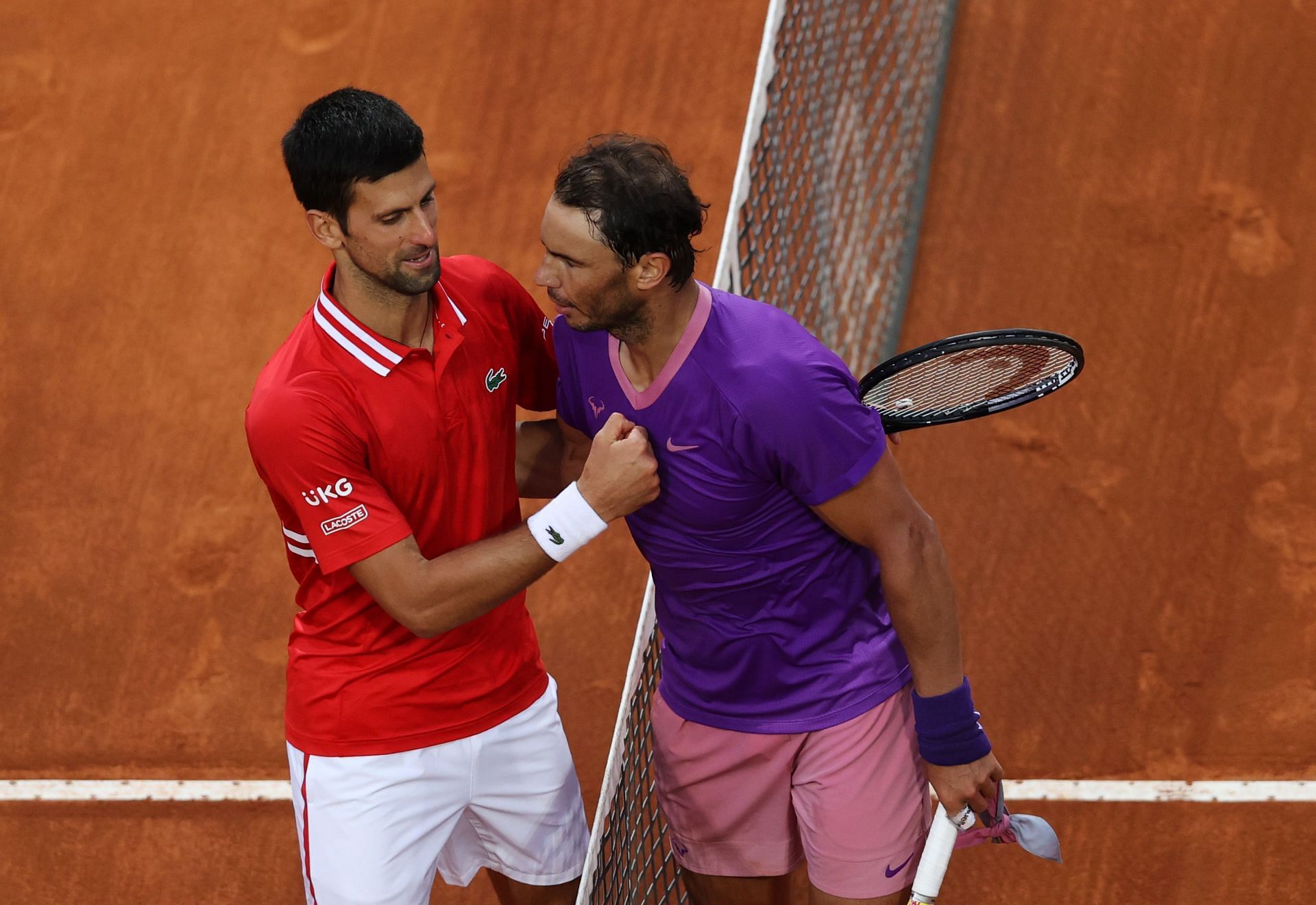 Novak Djokovic (L) and Rafael Nadal during the 2021 Internazionali BNL D&#039;Italia final.