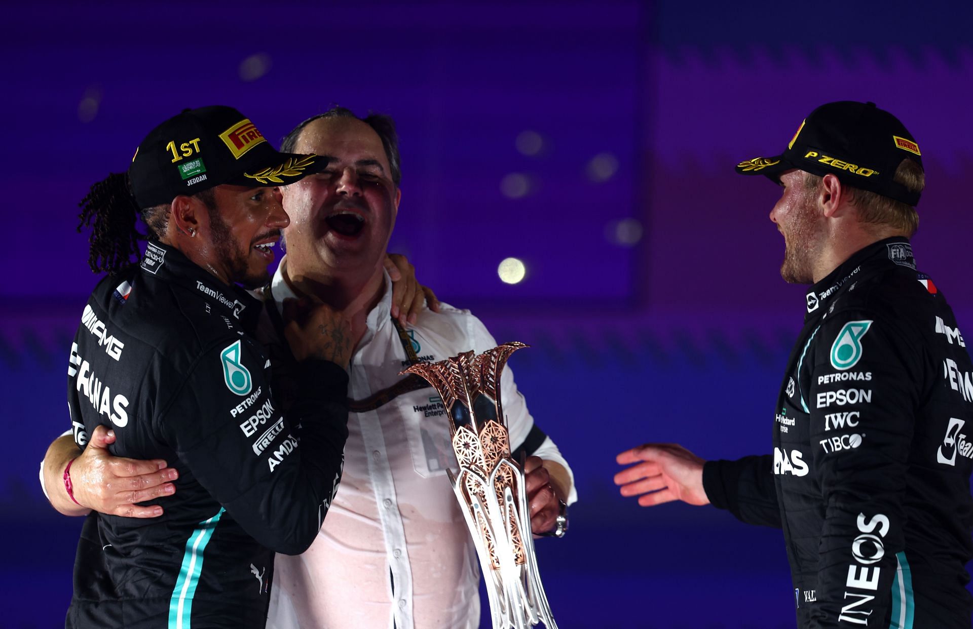 F1 Grand Prix of Saudi Arabia - Lewis Hamilton celebrates with Ron Meadows and Valtteri Bottas on the podium.