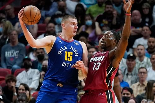 Nikola Jokic of Denver Nuggets in action against Bam Adebayo of Miami Heat last night.