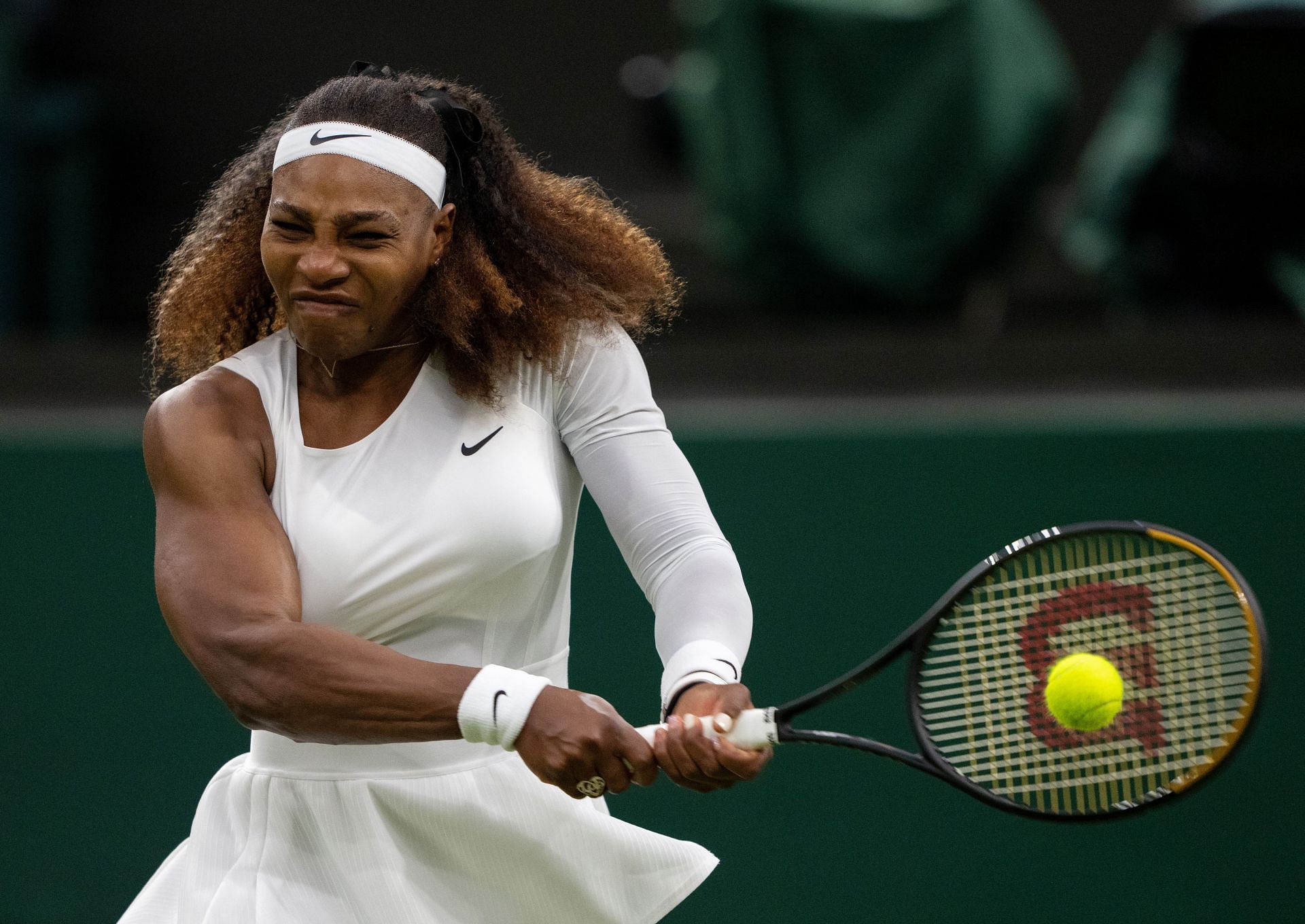 Serena Williams hits a backhand at Wimbledon 2021