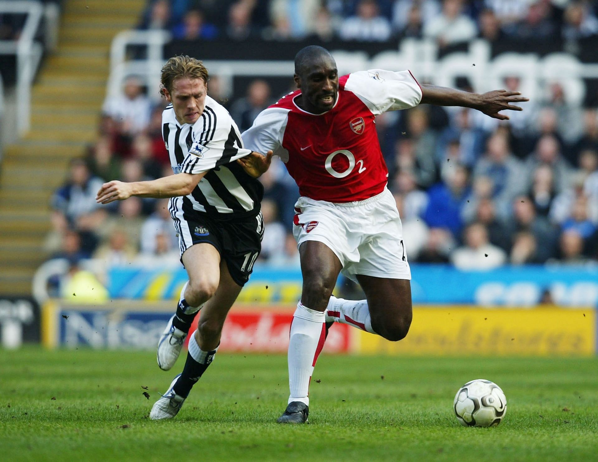 Campbell (right) of Arsenal v Newcastle United
