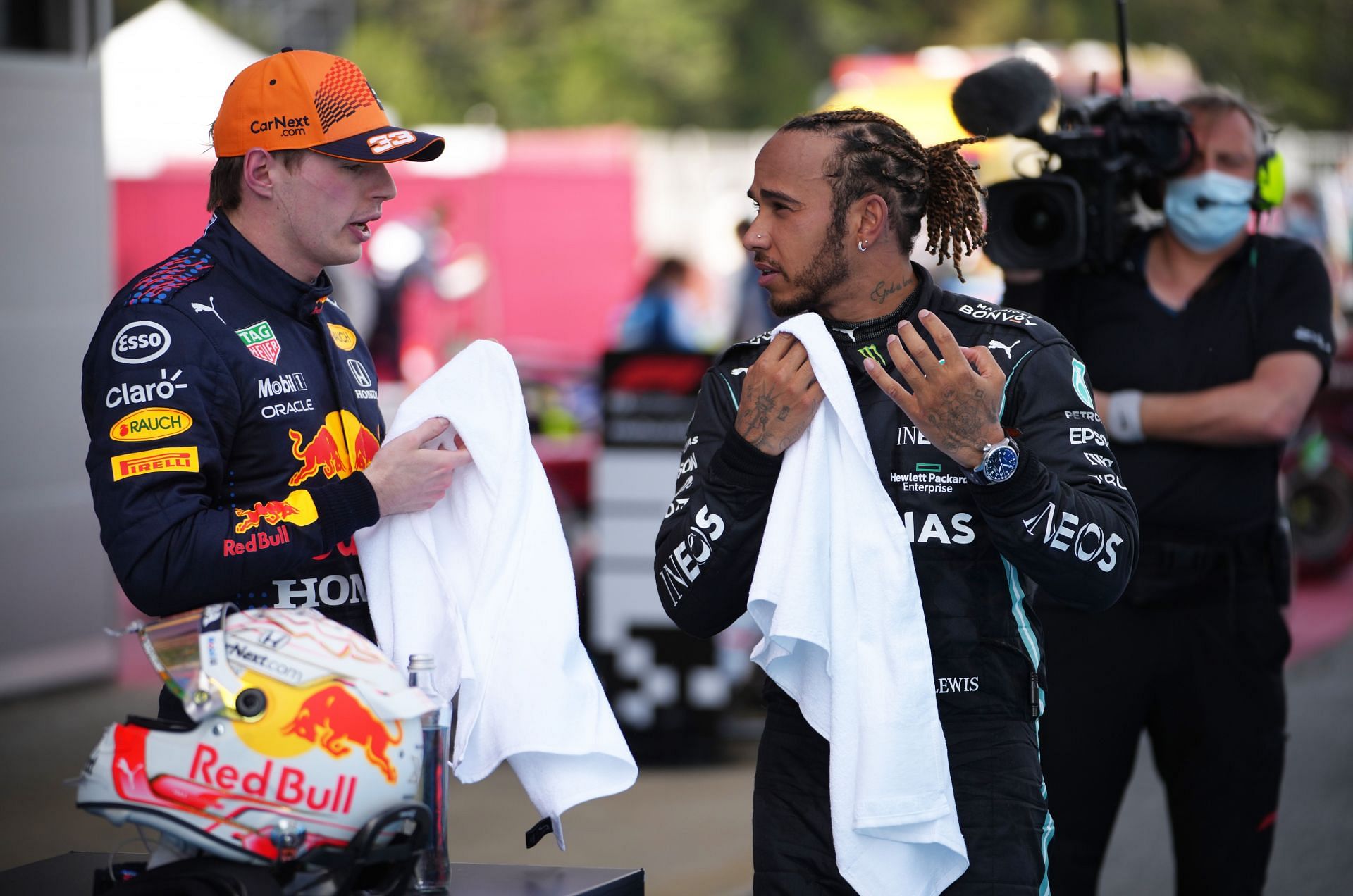 Max Verstappen (left) and Lewis Hamilton (right) exchange a few words after the 2021 Spanish Grand Prix