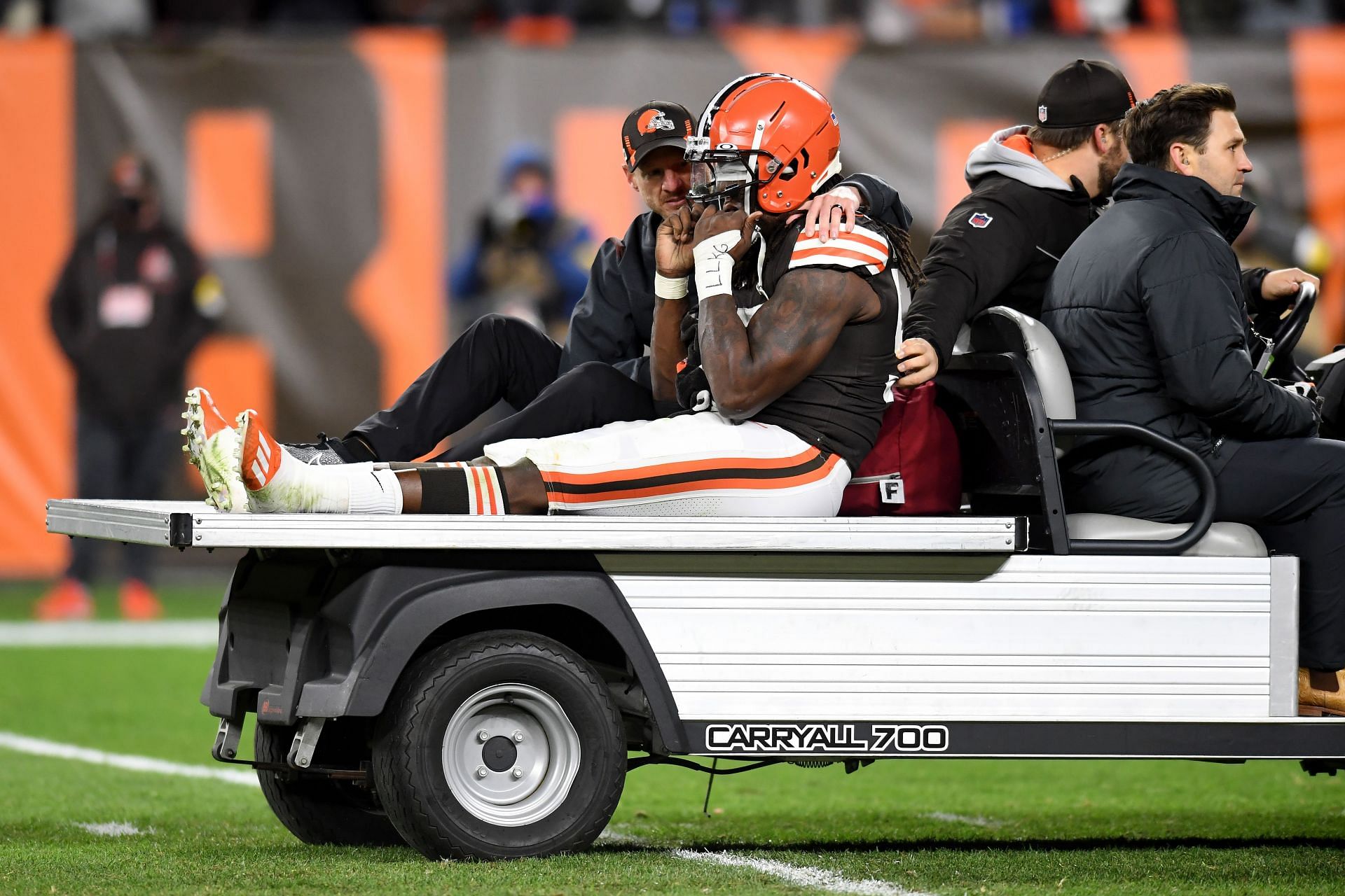 Cleveland Browns defensive end Takkarist McKinley is carted off