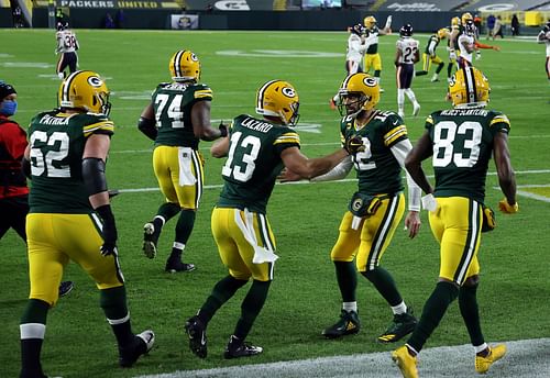 Allen Lazard celebrates with Rodgers on Sunday night